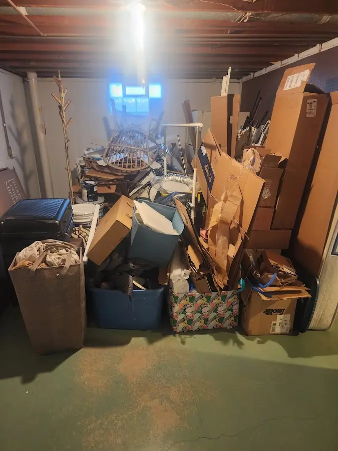 Roll-off dumpster container at job site for Construction Dumpster Rental in Elmhurst